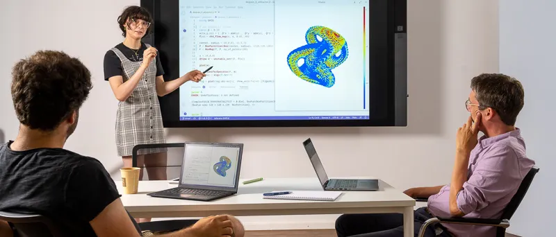 A group of researchers is discussing the computation and representation of an attractor, a set containing all the states of a time-varying system that are actually assumed over time.